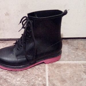 Pink and black boots